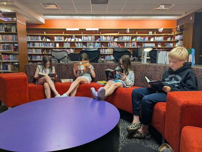Children reading books at Cape Girardeau, MO, Carnegie Libraries