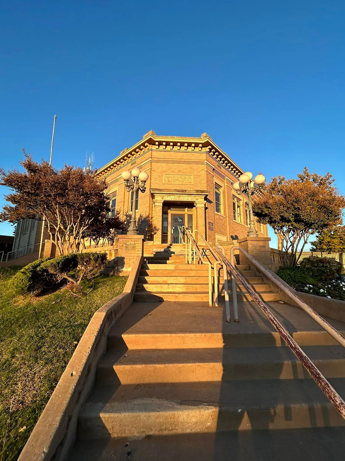 A library above stairs and someone's shadow