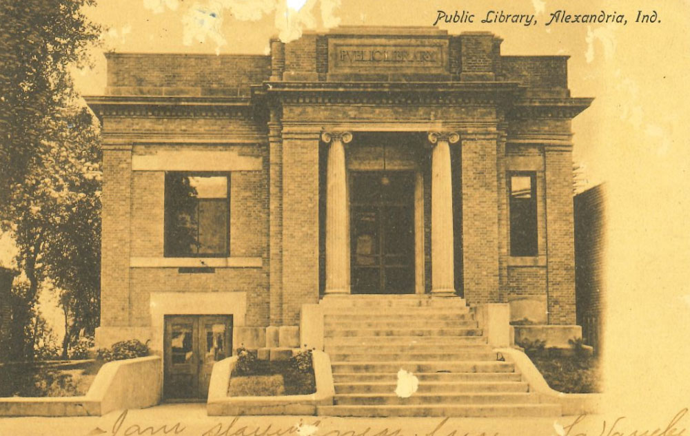 Terri-Smith-postcard-lib A sepia postcard of an old library with brick and columns