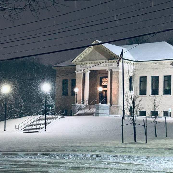 winter-spl-building---Brian-Rowlands A lirarie with columns at night in winter.
